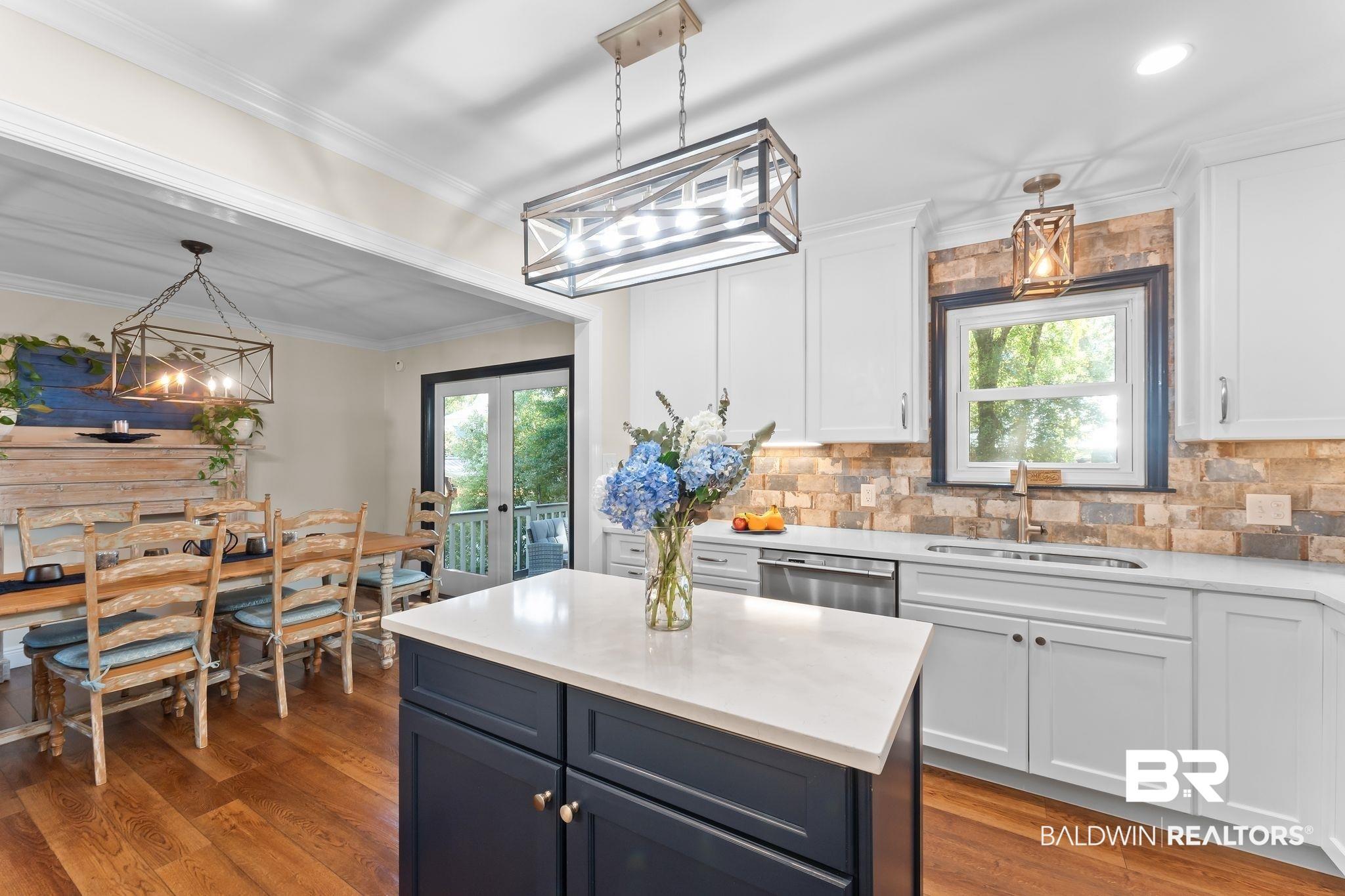Image 2: Kitchen with Quartz Countertops and New White Cabinets