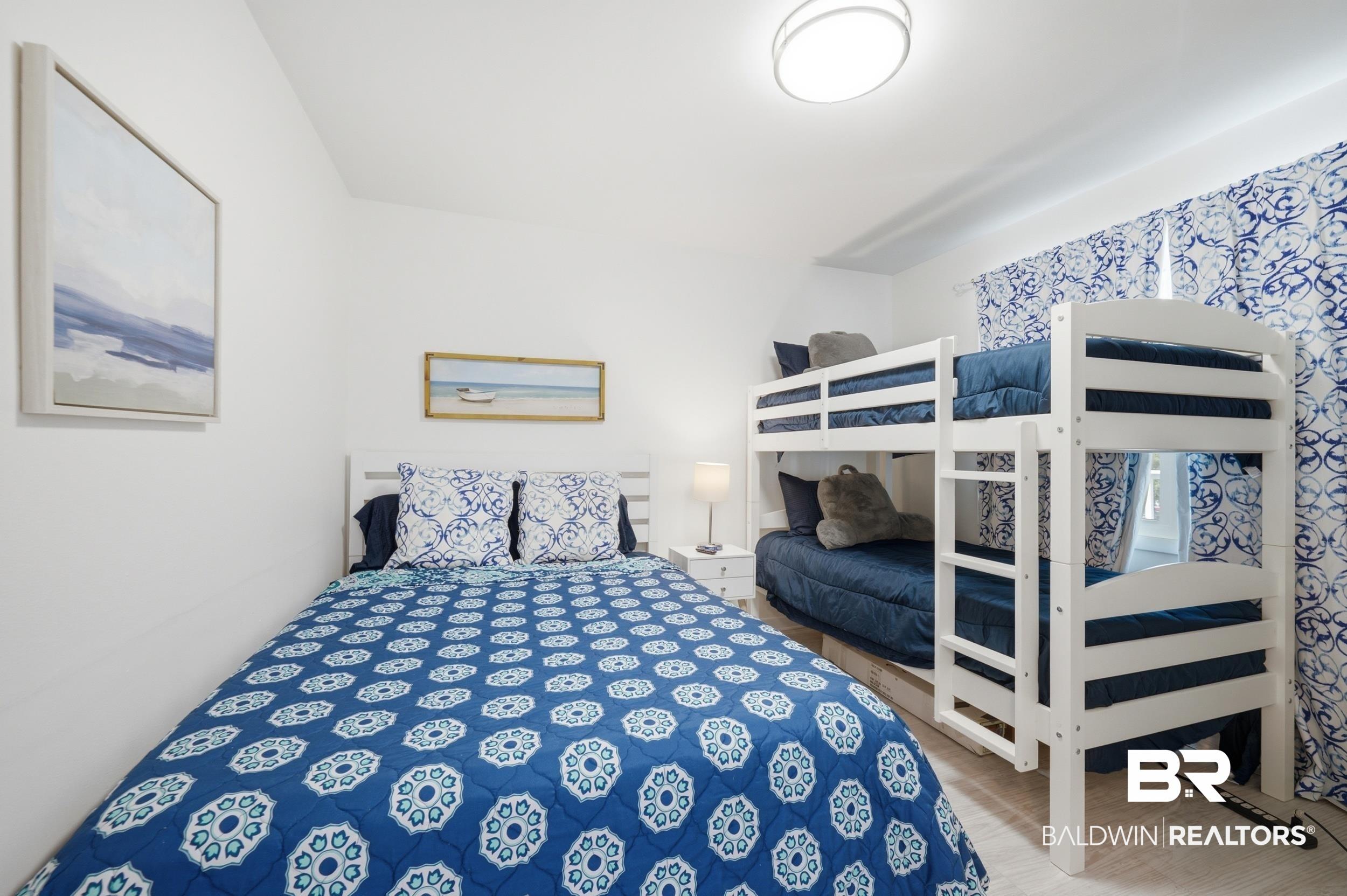 Image 3: White-painted walls and light-toned flooring create a bright atmosphere