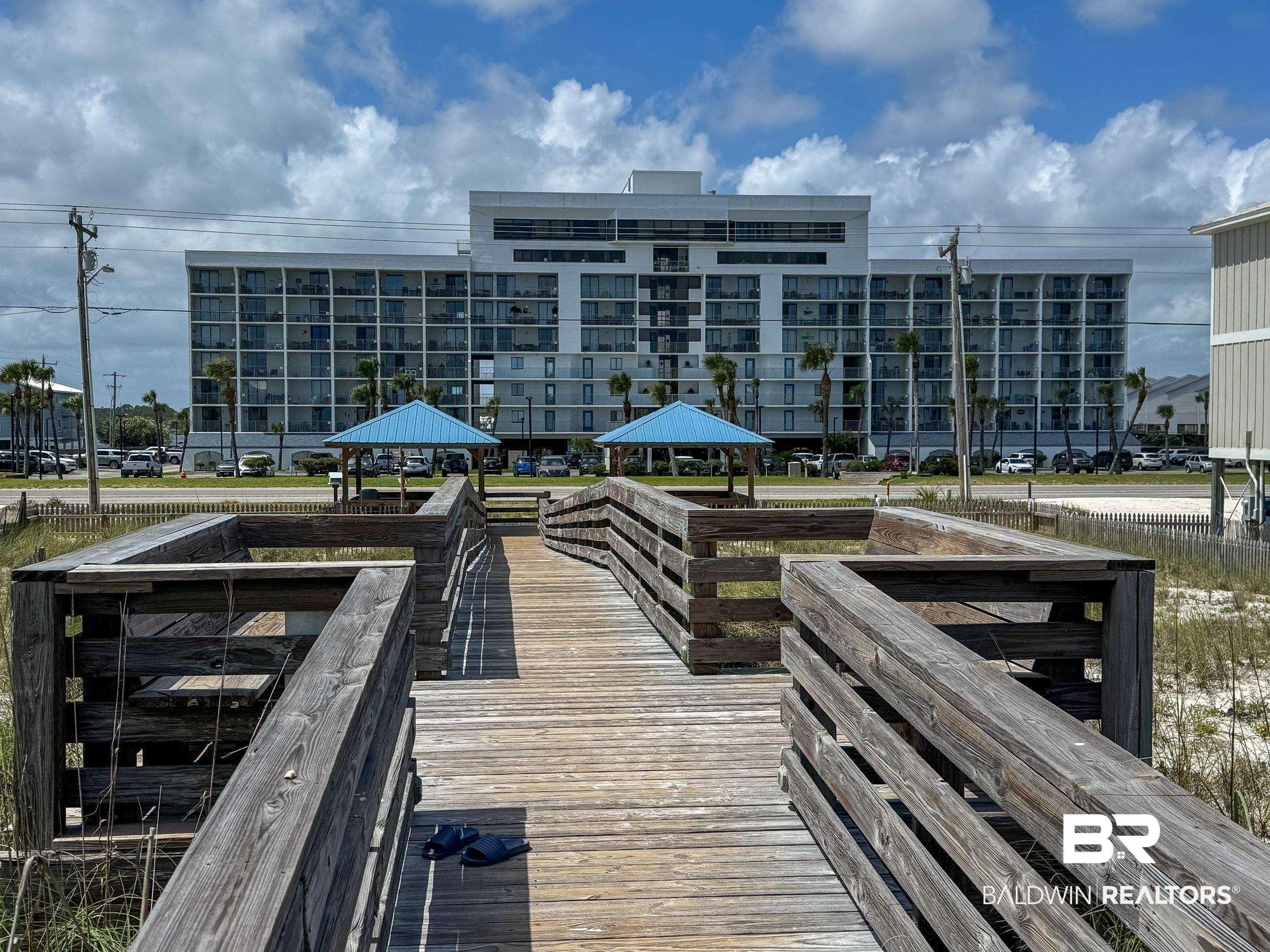 Image 2: Private deeded beach accesss a few steps away.
