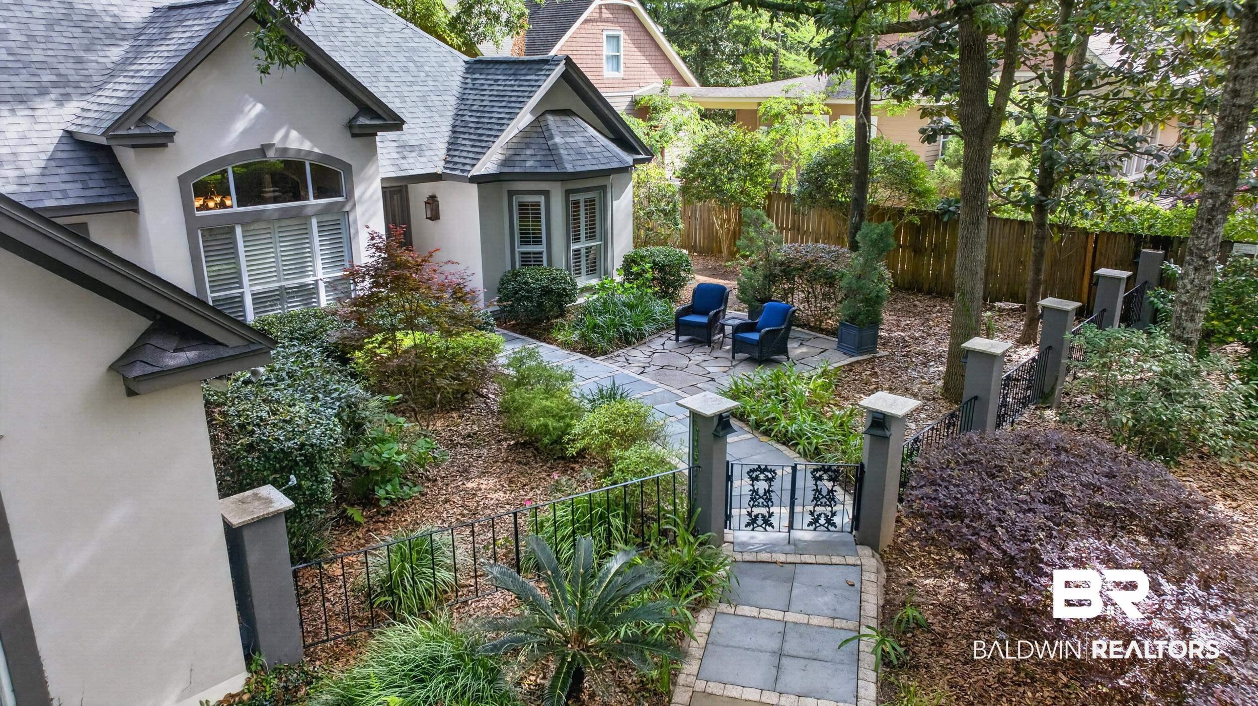 Image 4: Fenced yard featuring a patio