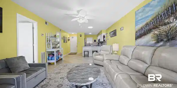 Image 4: Living area with recessed lighting, a ceiling fan, and light tile patterned floors