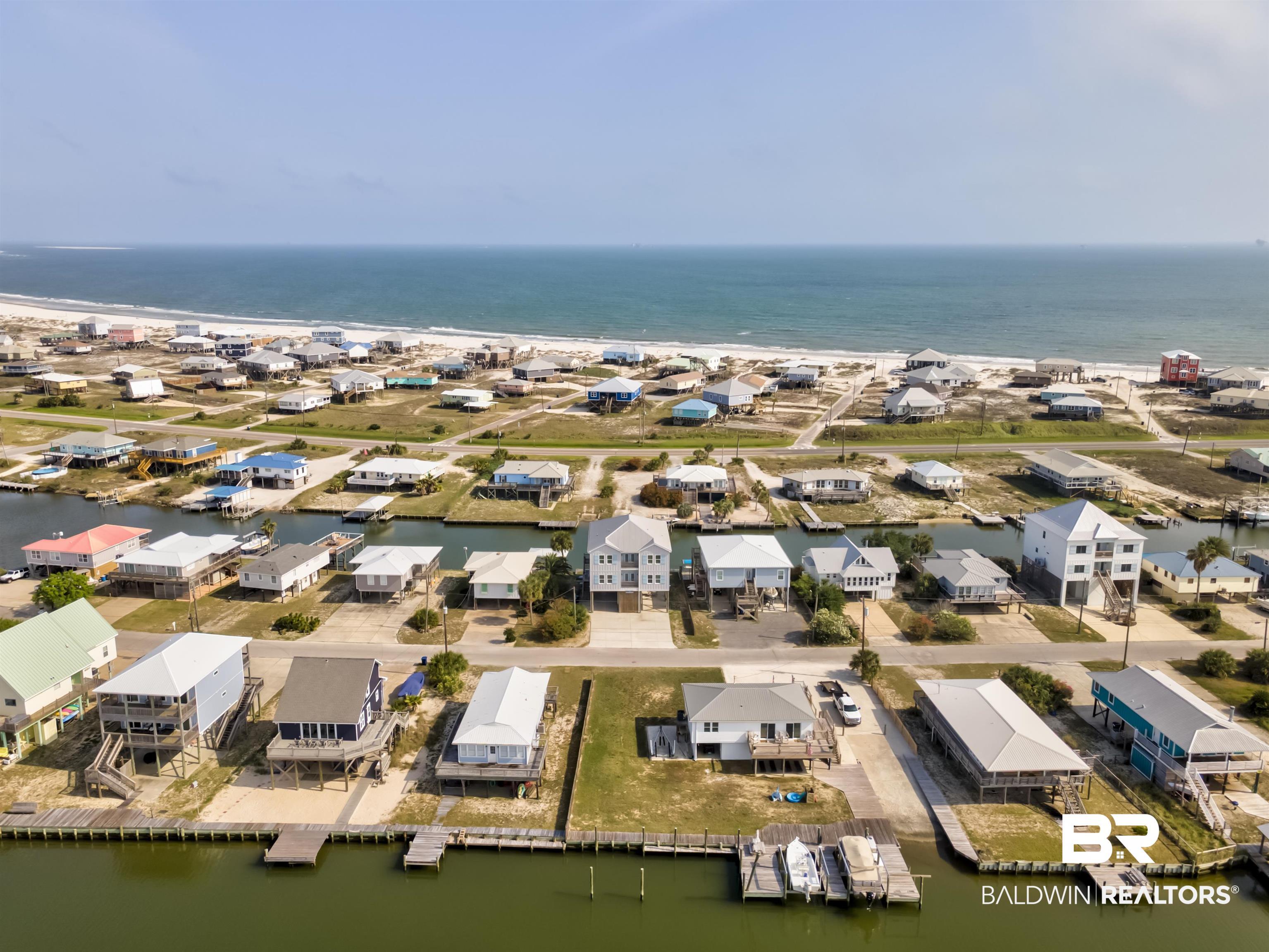 Image 4: Coastal community featuring waterfront properties and direct Gulf access