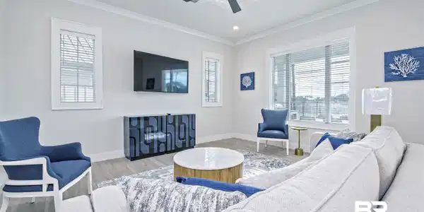 Image 4: Living room featuring ornamental molding, light hardwood / wood-style floors, and ceiling fan