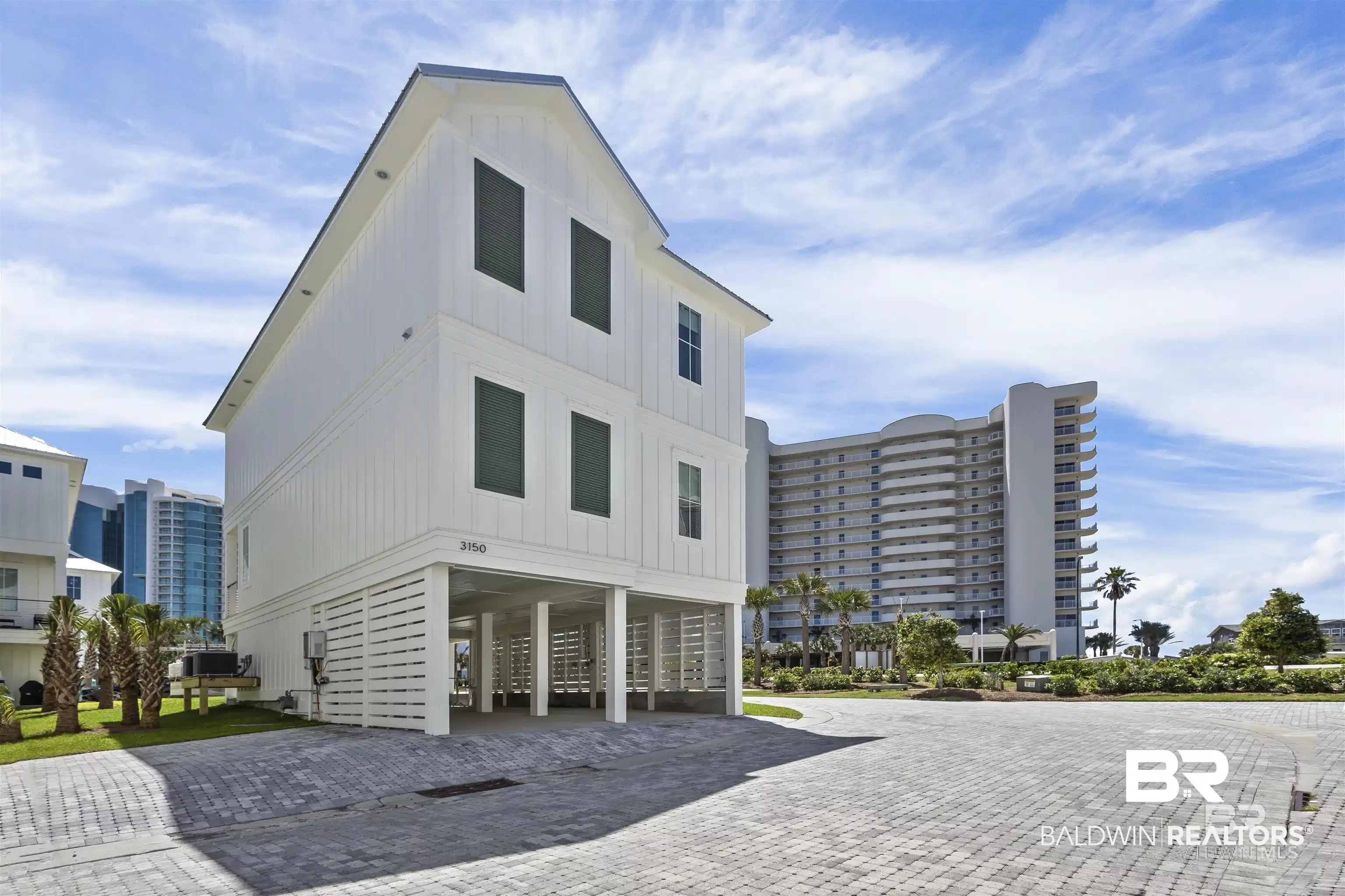 Image 1: View of apartment building / complex