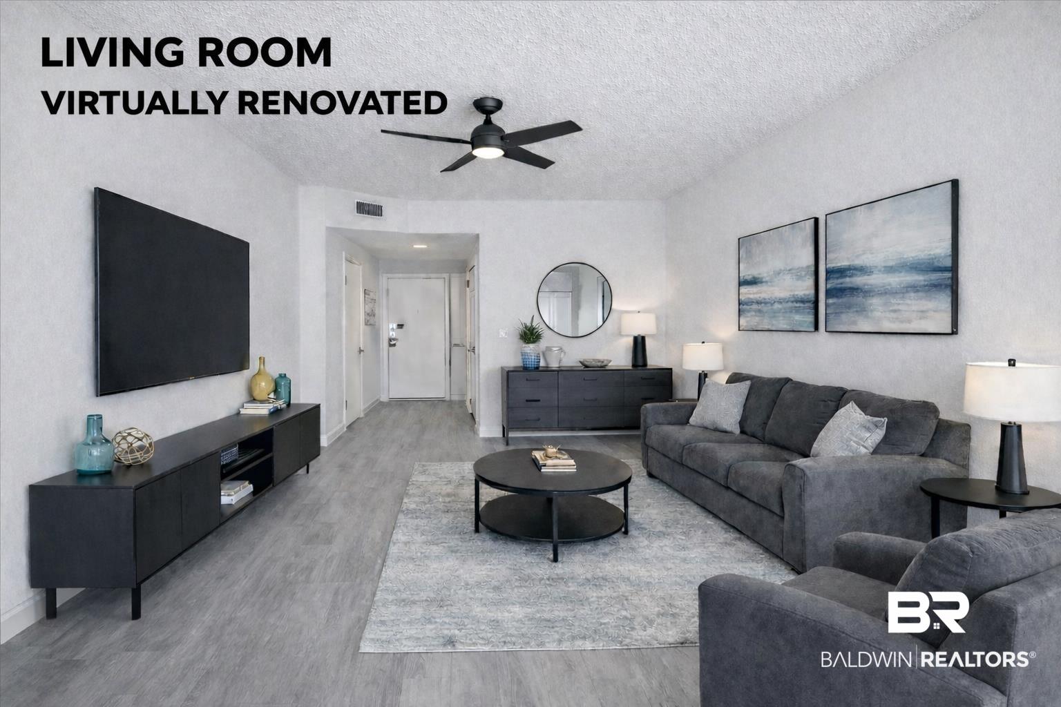 Image 4: Living area with a ceiling fan, wood finished floors, and a textured ceiling