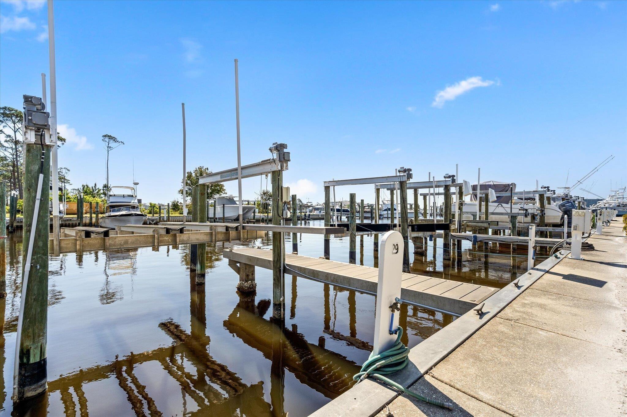 Image 1: View of dock with a water view and boat lift