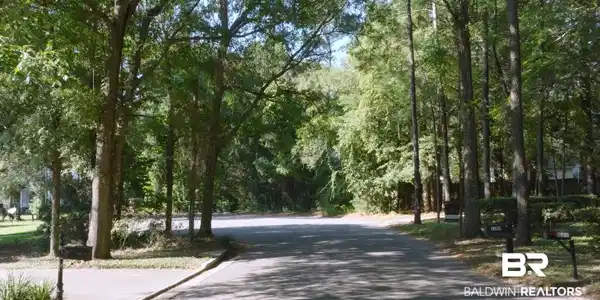 Image 4: Surrounding community featuring a view of trees