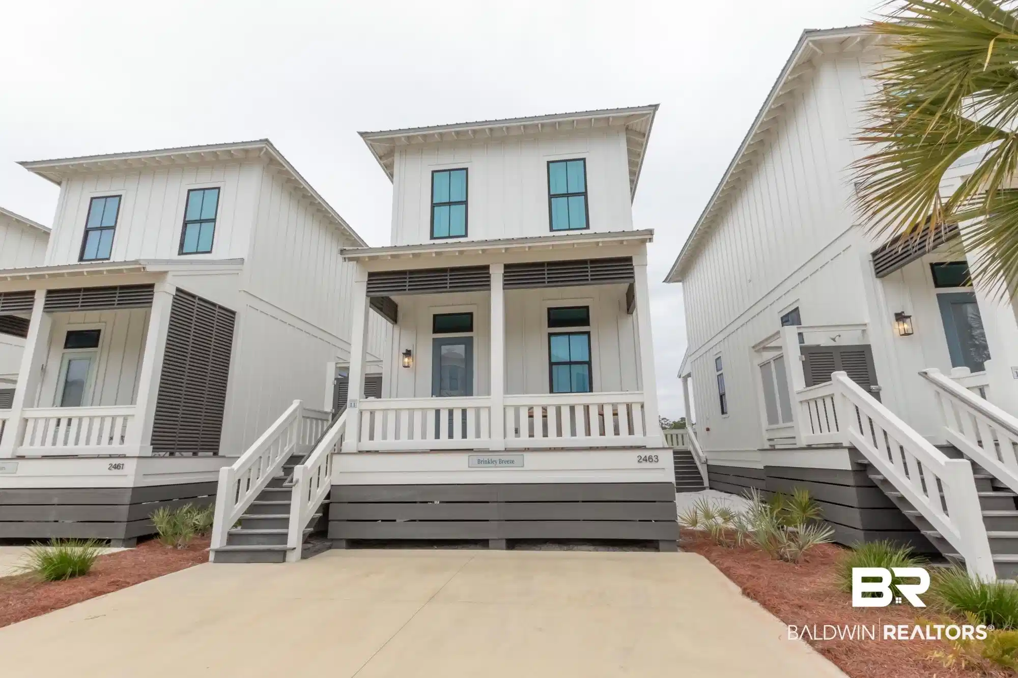 Image 1: Modern farmhouse style home featuring a porch and stairs