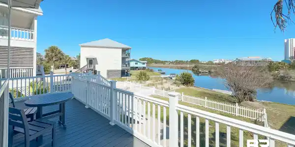 Image 2: Wooden deck with a water view