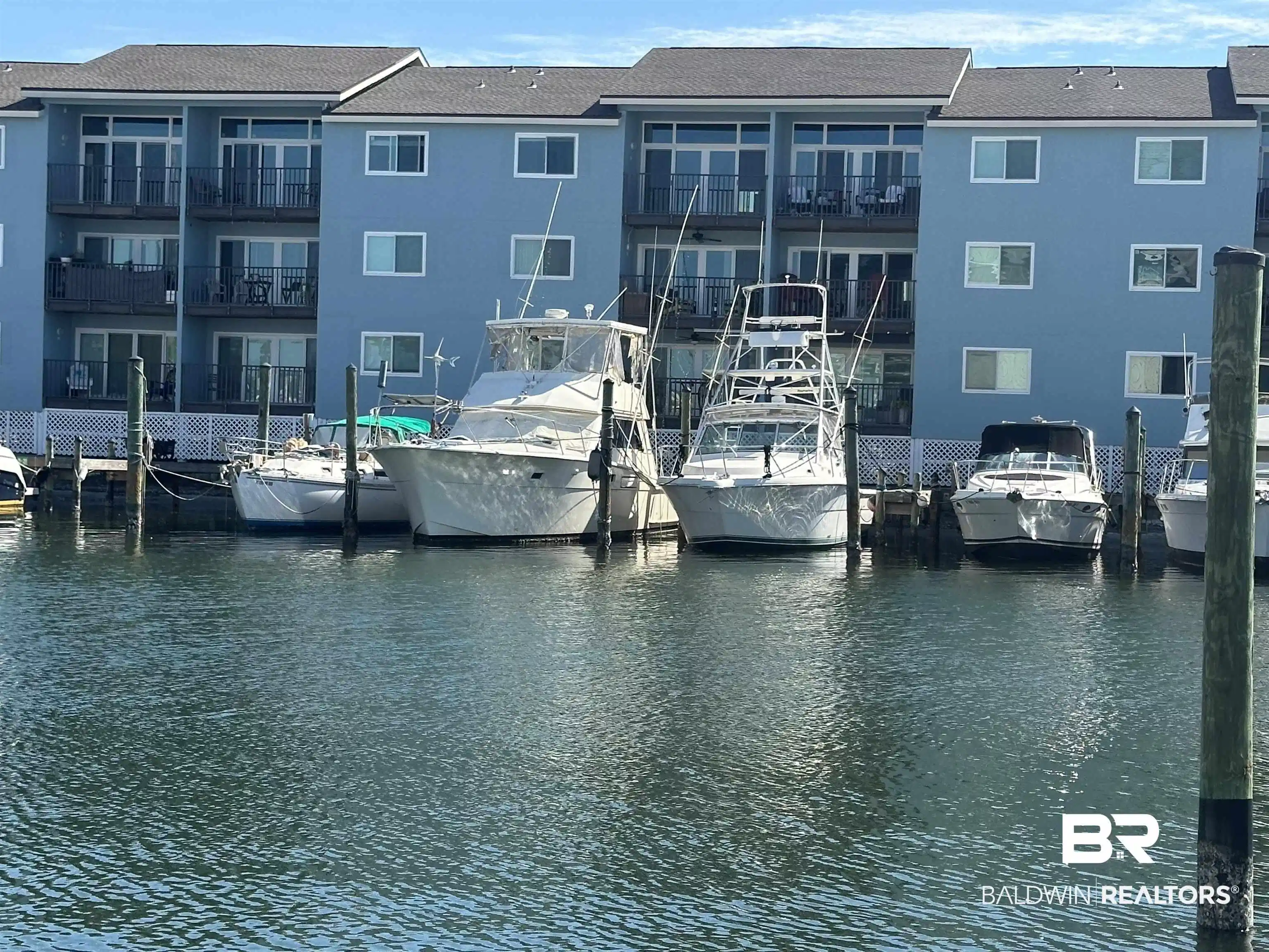 Image 1: Dock area featuring a water view