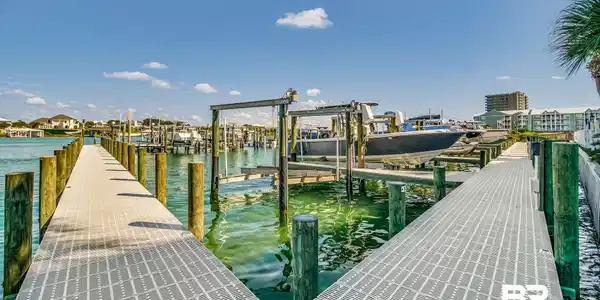 Image 2: Dock with boat lift and a water view