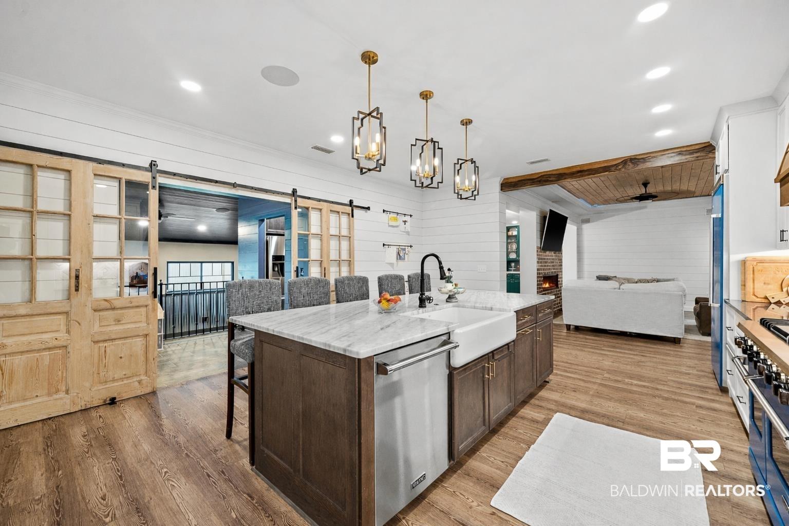 Image 4: Luke Phillips' barn doors open to Entertainment Room
