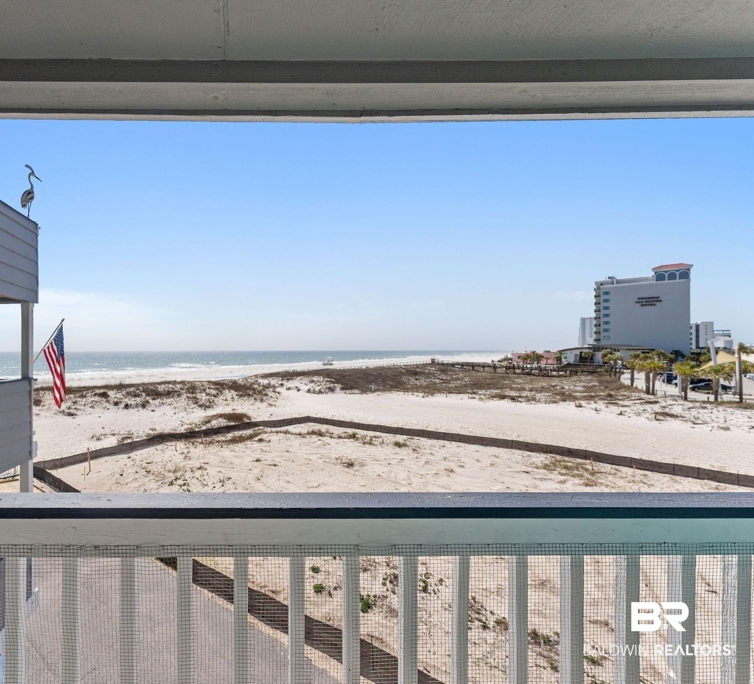 Image 2: Water view featuring local beach