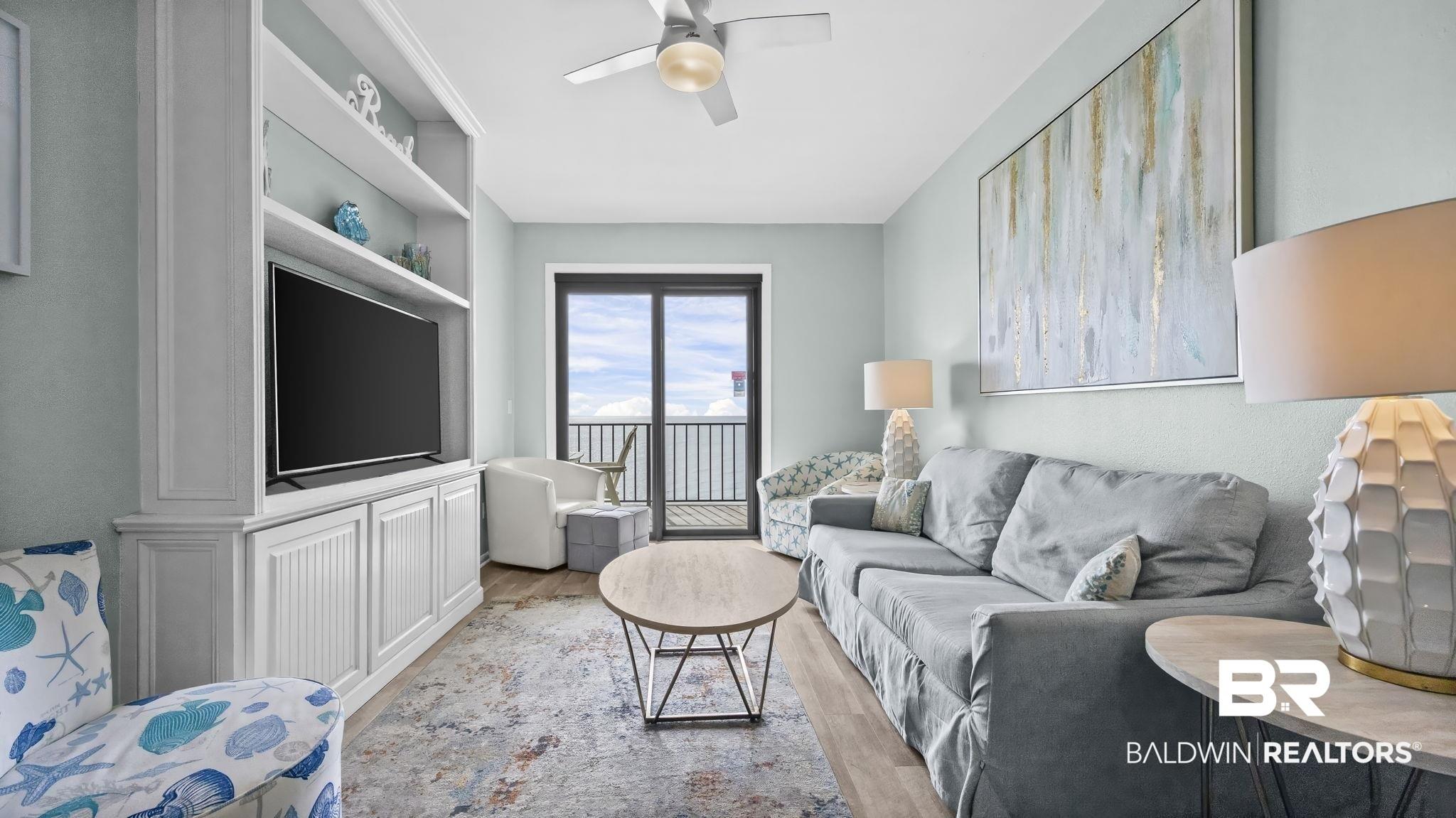 Image 3: Living room featuring wood finished floors and ceiling fan