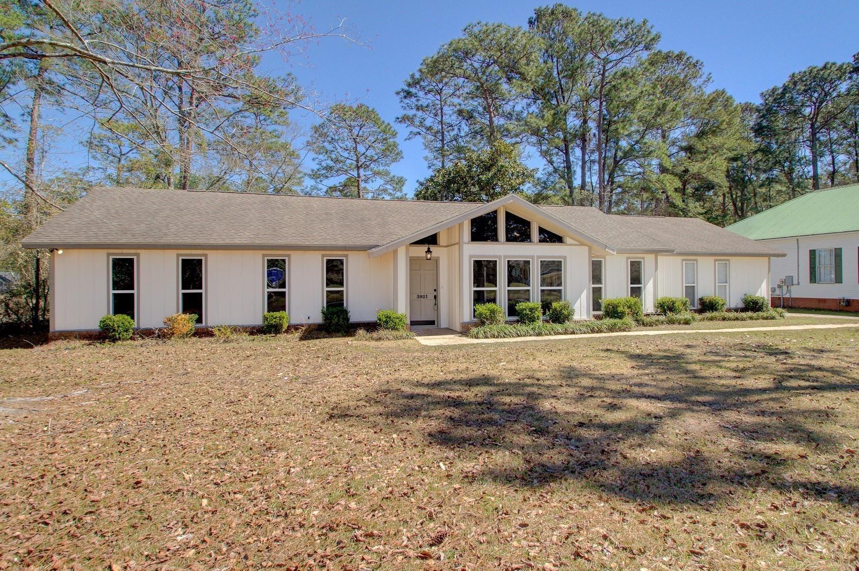 Image 4: View of front of property featuring roof with shingles