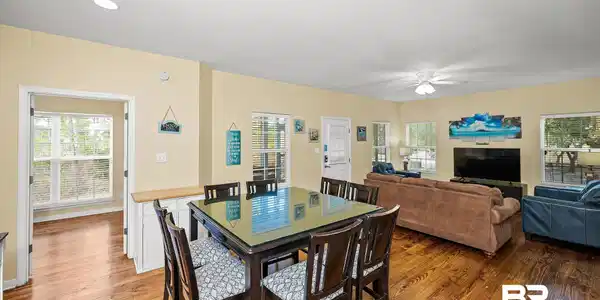 Image 4: Dining room with plenty of natural light, light wood-style floors, and a ceiling fan