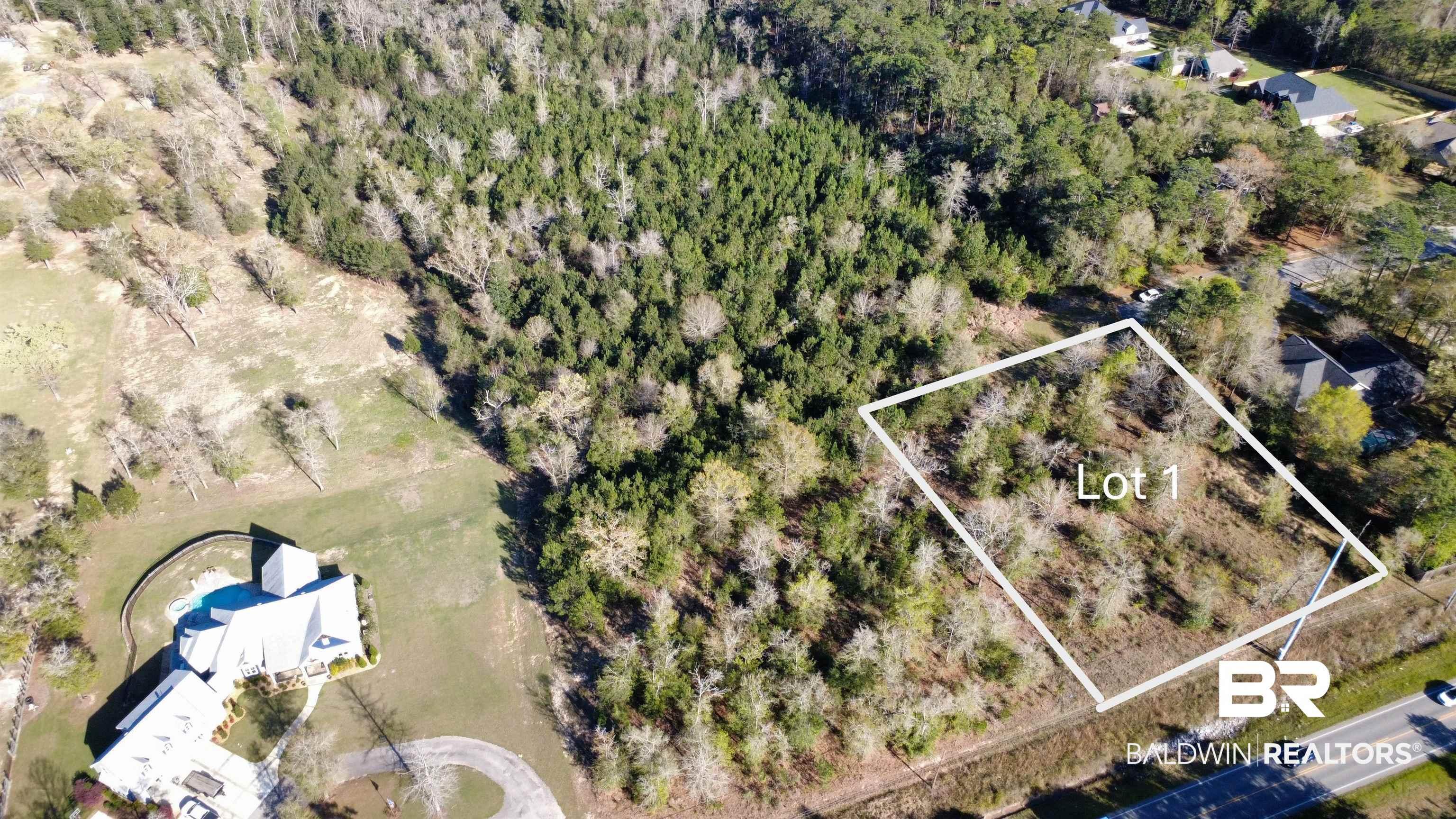 Image 1: Aerial view of property and surrounding area with property parcel outlined