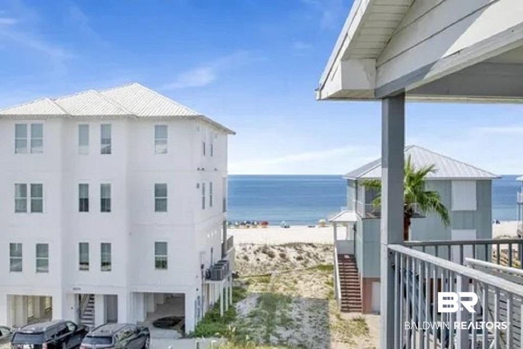 Image 3: Coastal property featuring an expansive white sand beach and Gulf view