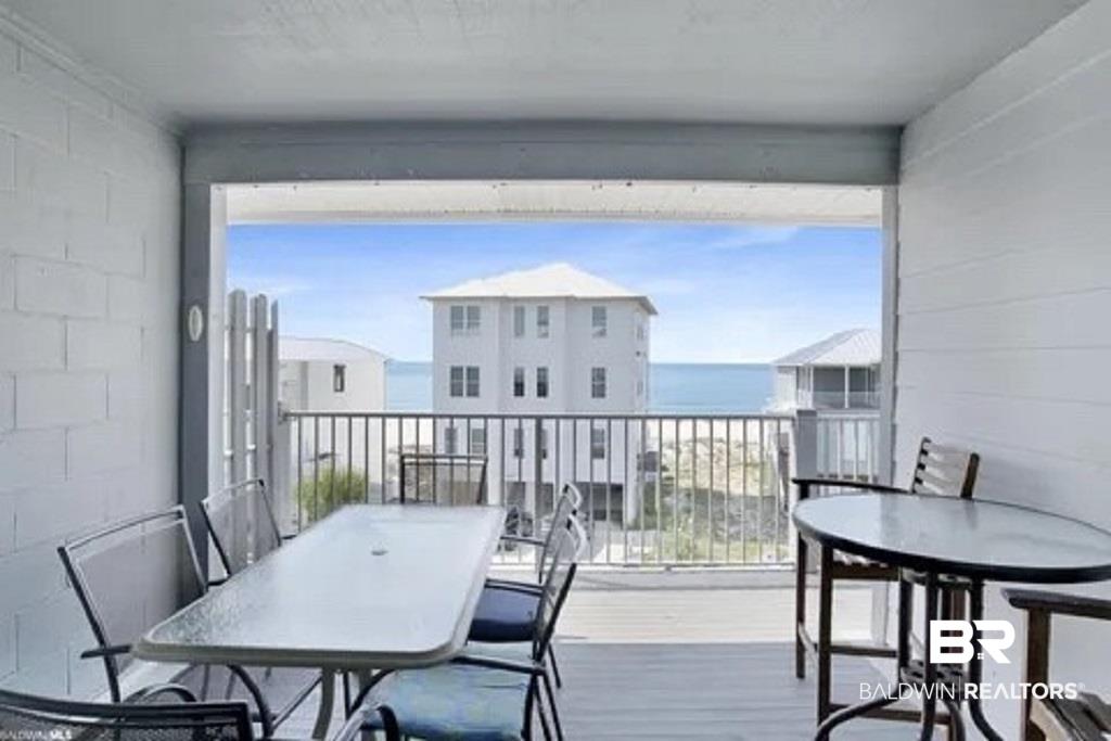 Image 4: Covered patio with a panoramic Gulf vista