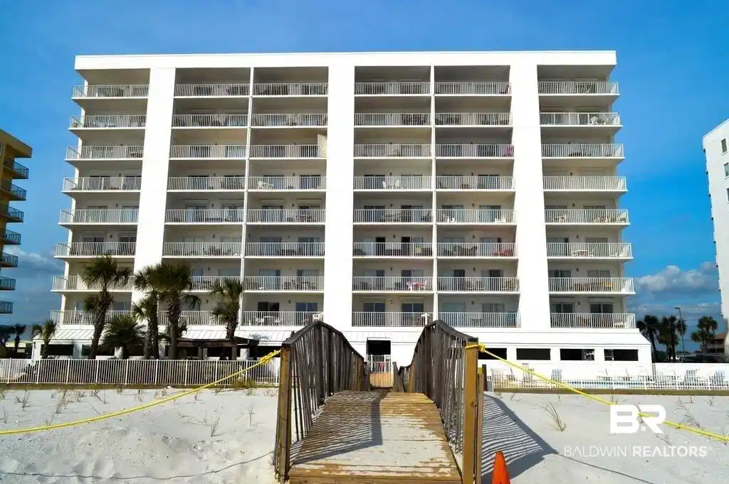 Image 1: View of apartment building / complex