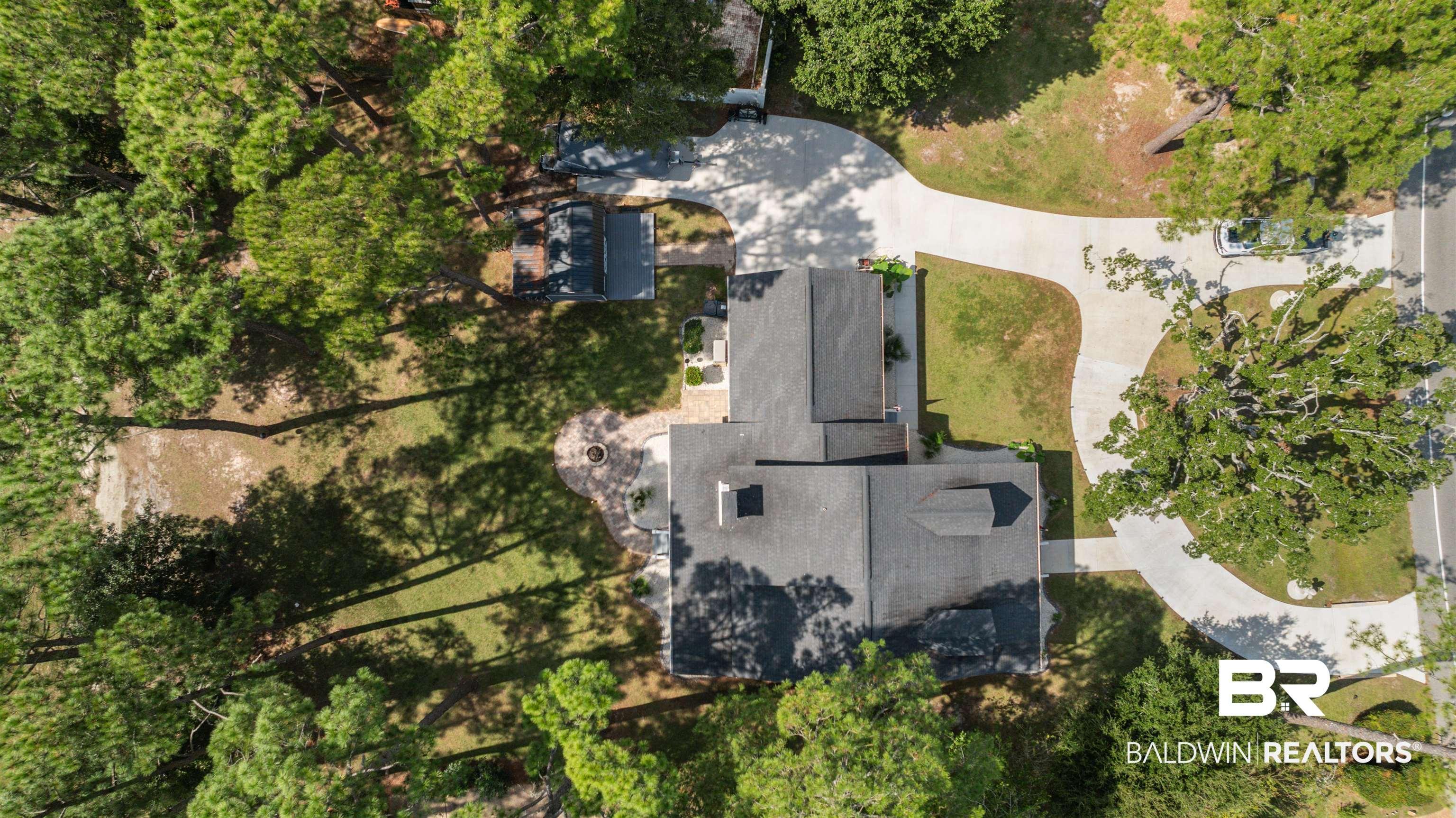 Image 2: Aerial view of property and surrounding area
