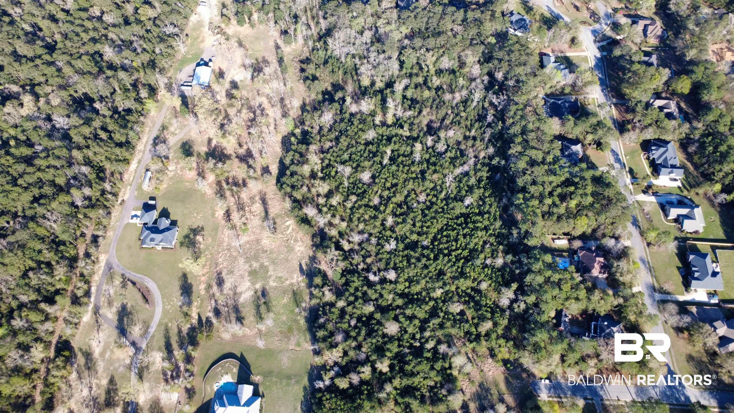 Image 2: Aerial view of property and surrounding area