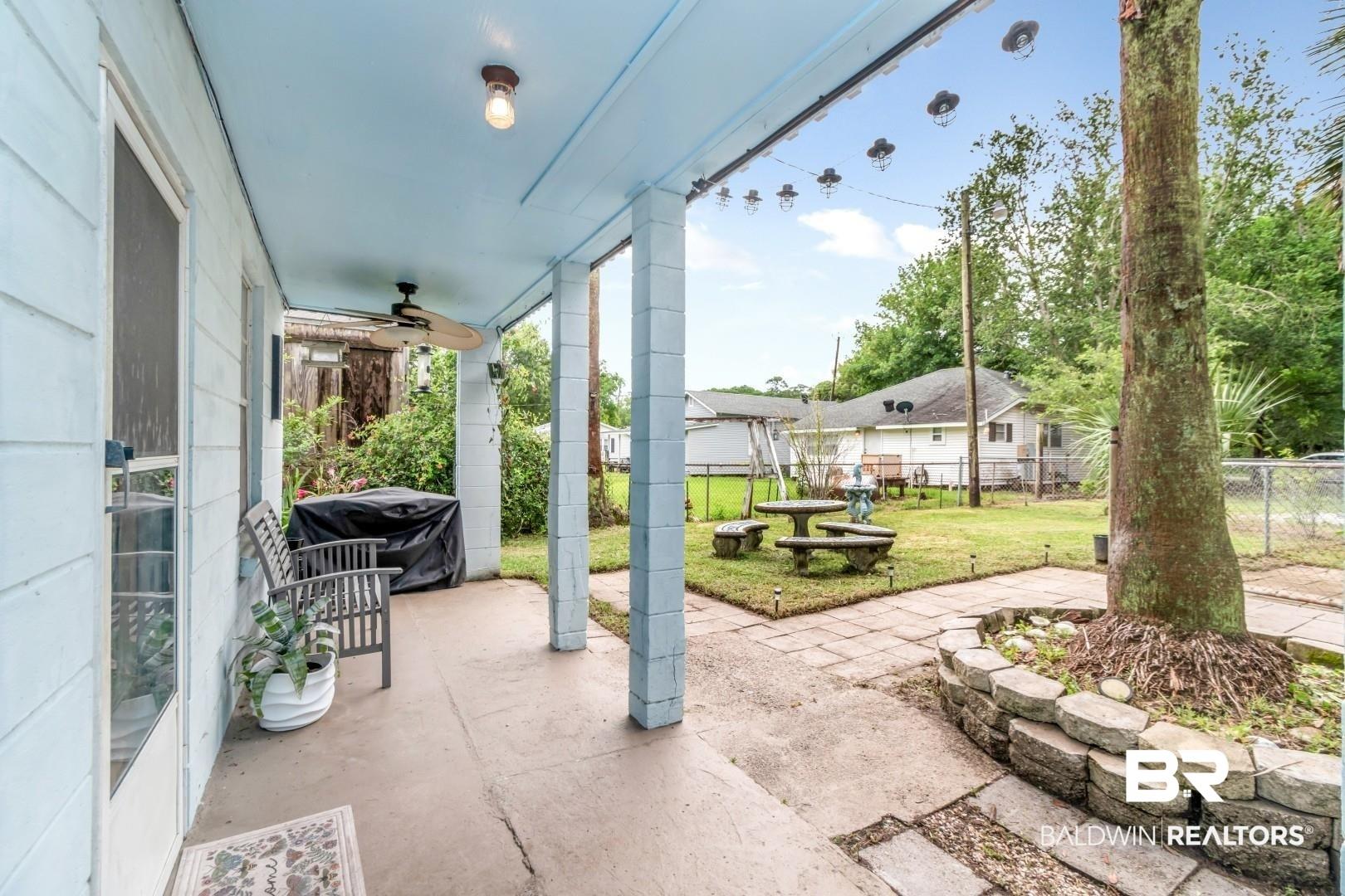Image 4: Patio terrace for downstairs unit