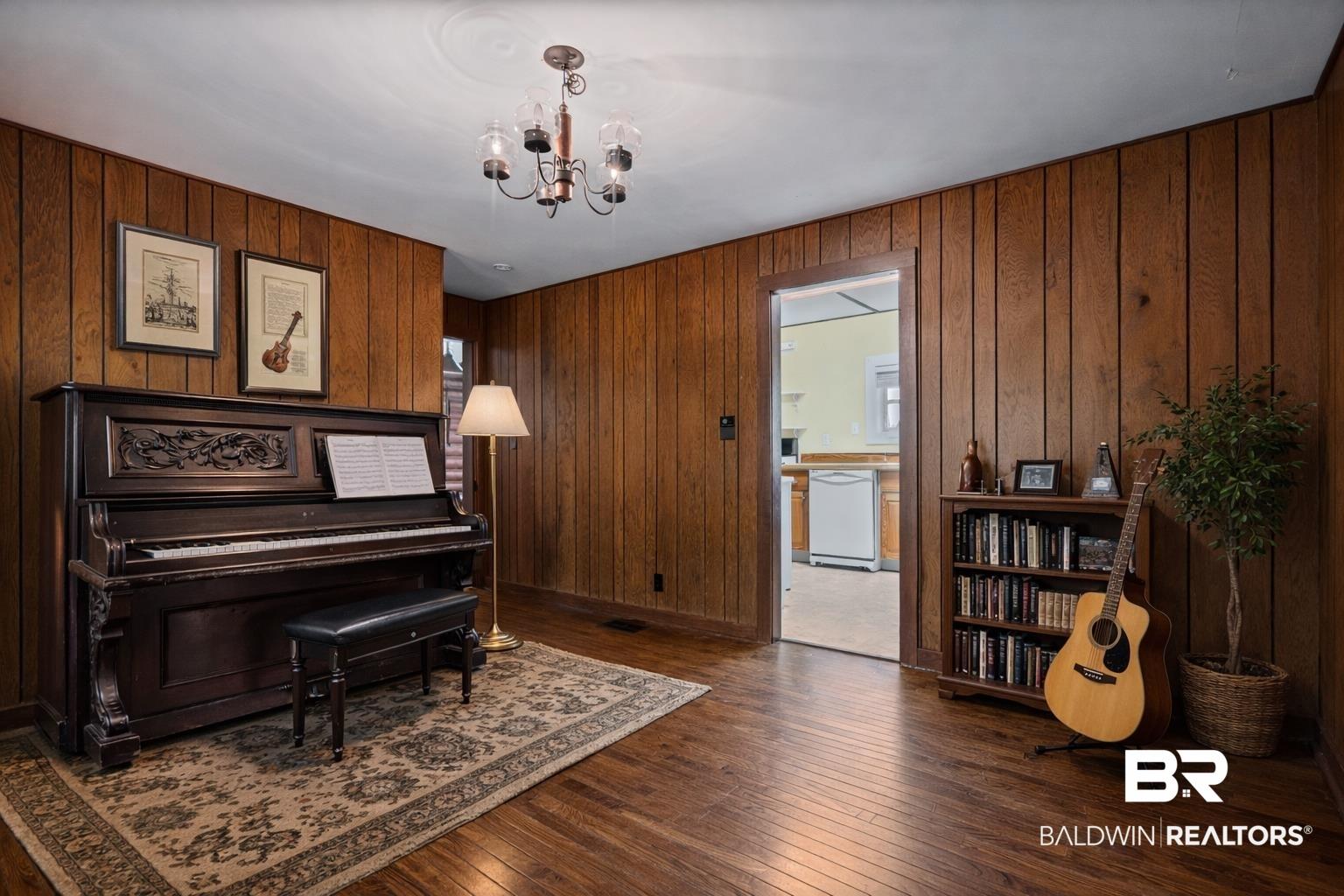 Image 4: music room and foyer in the center of the house