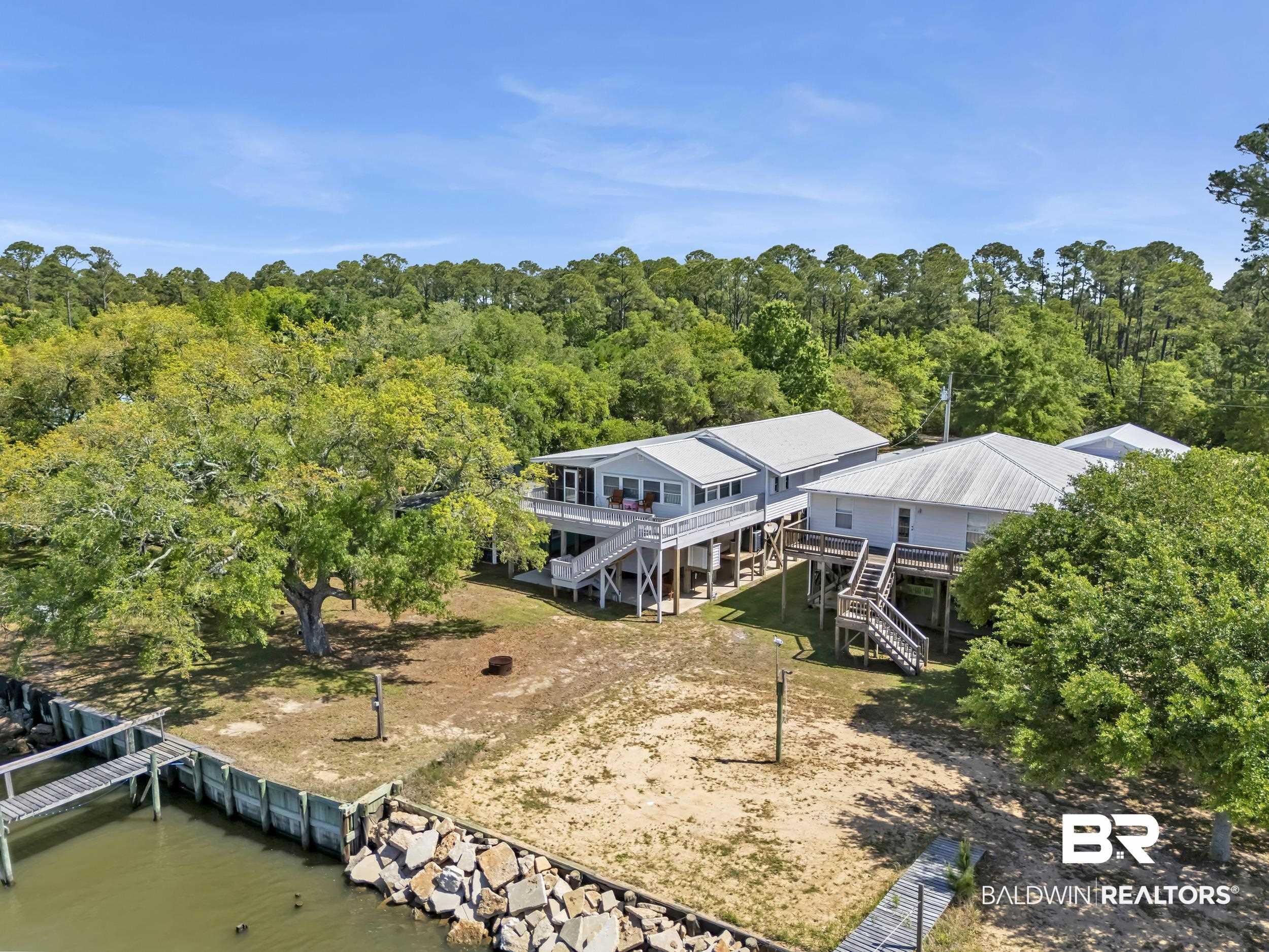 Image 2: View from above of property with a nearby body of water