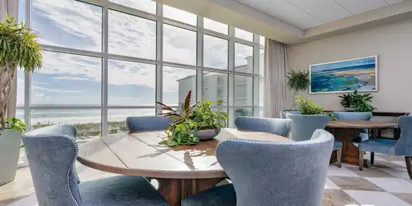 Image 2: Floor-to-ceiling windows with expansive ocean scenery