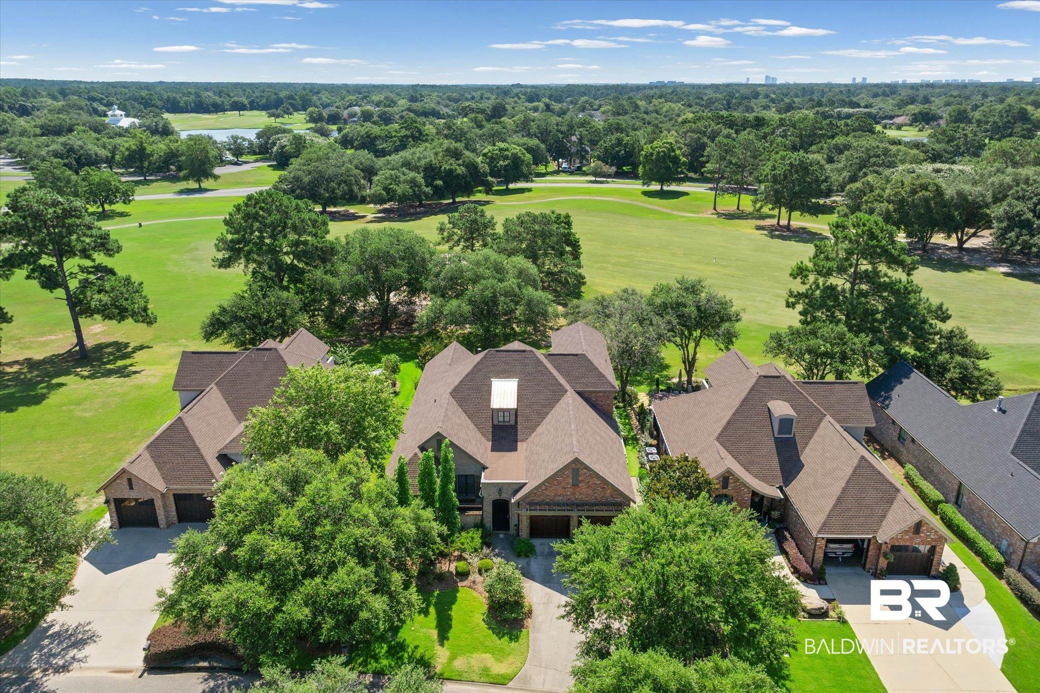Image 3: Aerial of Home and Golf Course