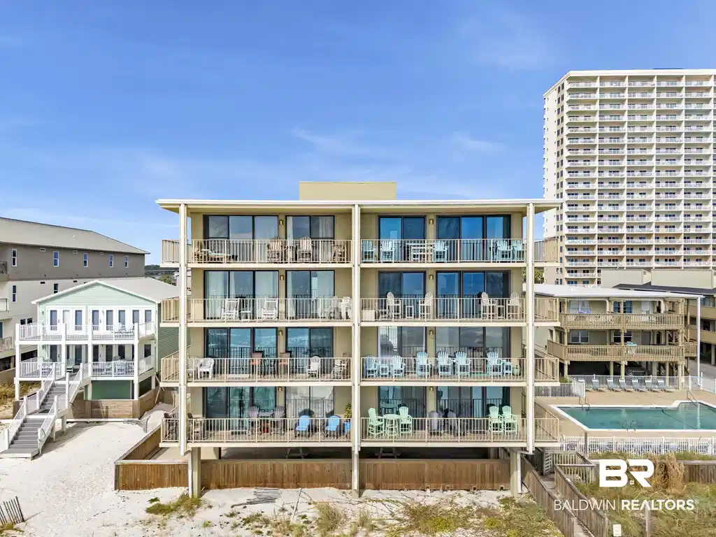 Image 1: View of apartment building / complex