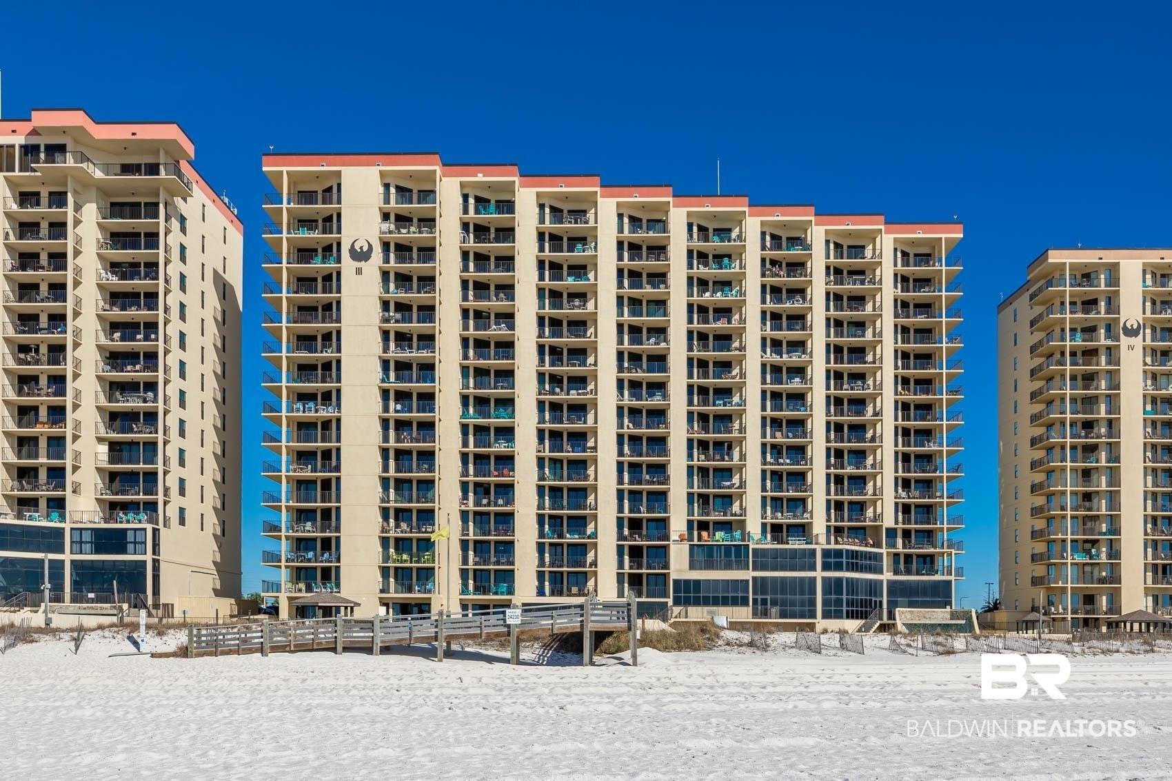 Image 1: Multi-story residential buildings featuring individual balconies and a neutral-toned facade