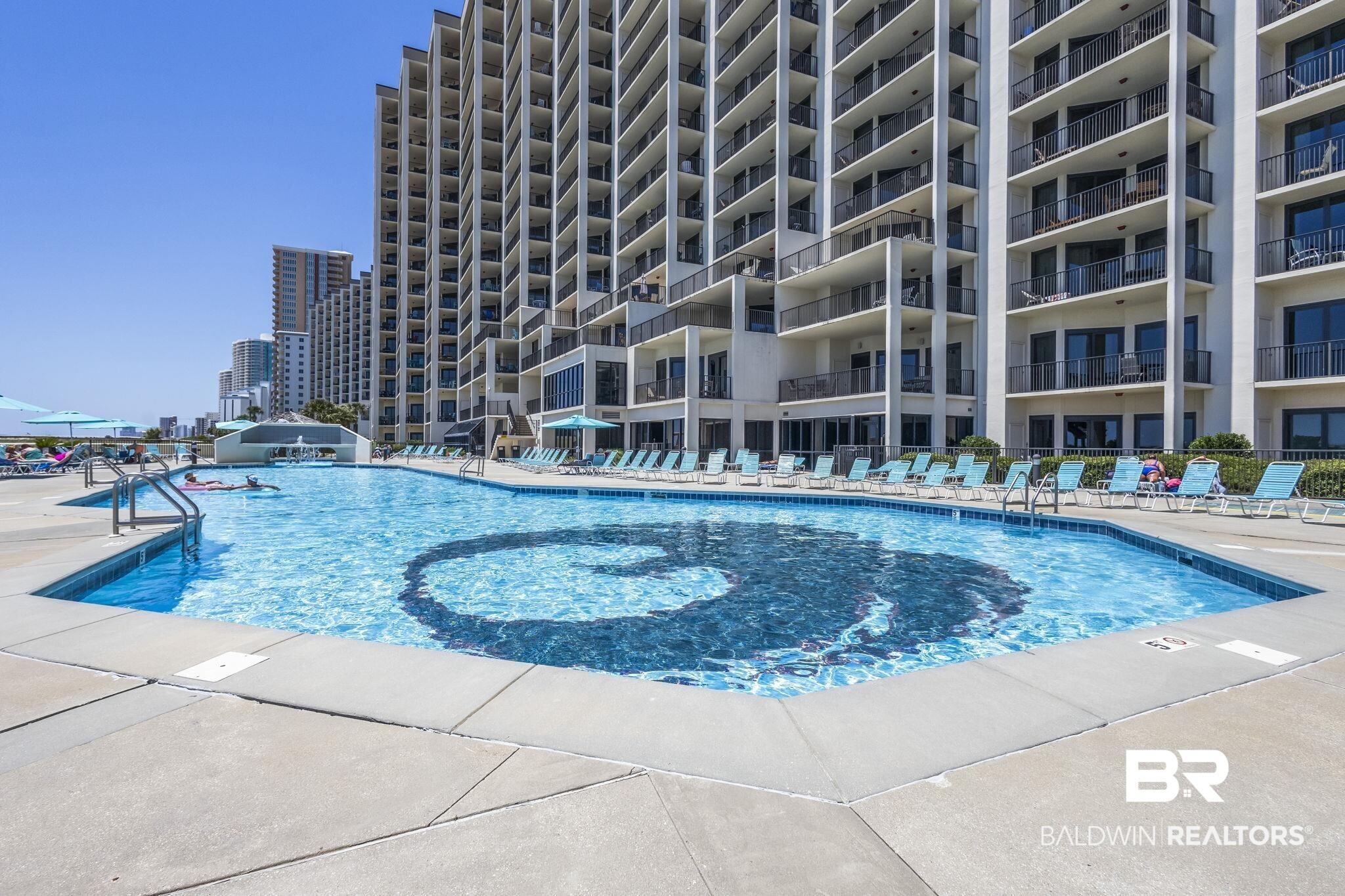 Image 2: Pool featuring a patio area