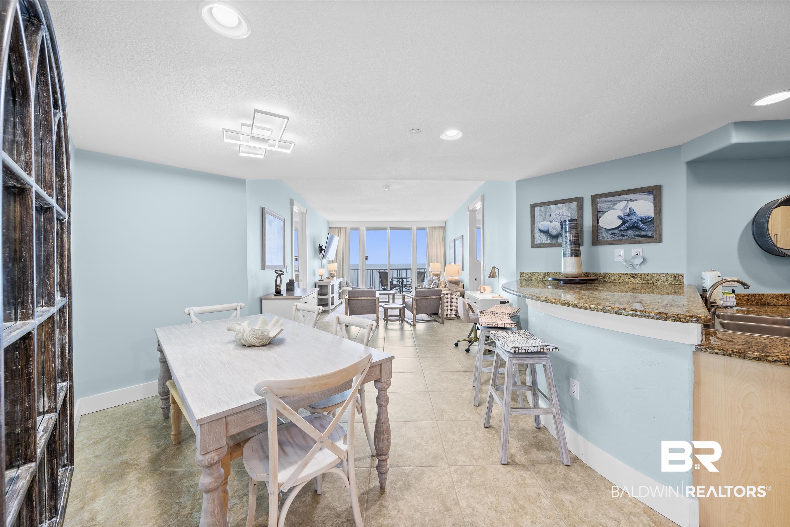 Image 3: Dining space featuring baseboards and recessed lighting