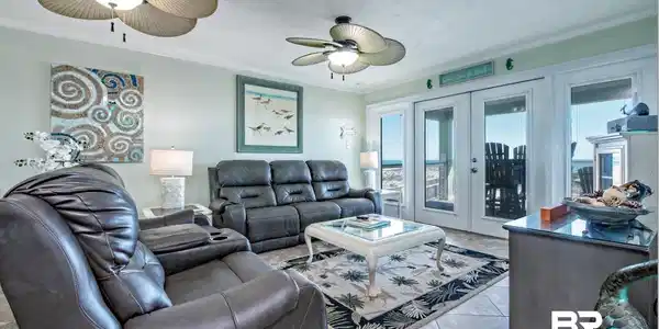 Image 2: Living room featuring french doors, crown molding, and ceiling fan