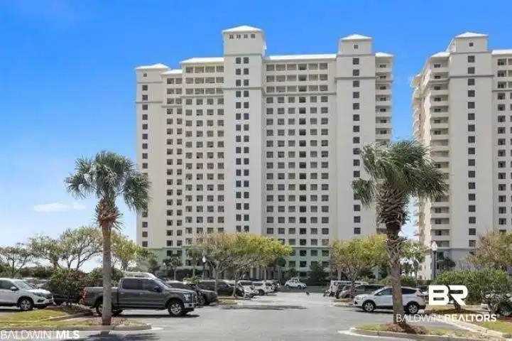 Image 1: Multi-story residential buildings featuring numerous balconies and a light-colored facade
