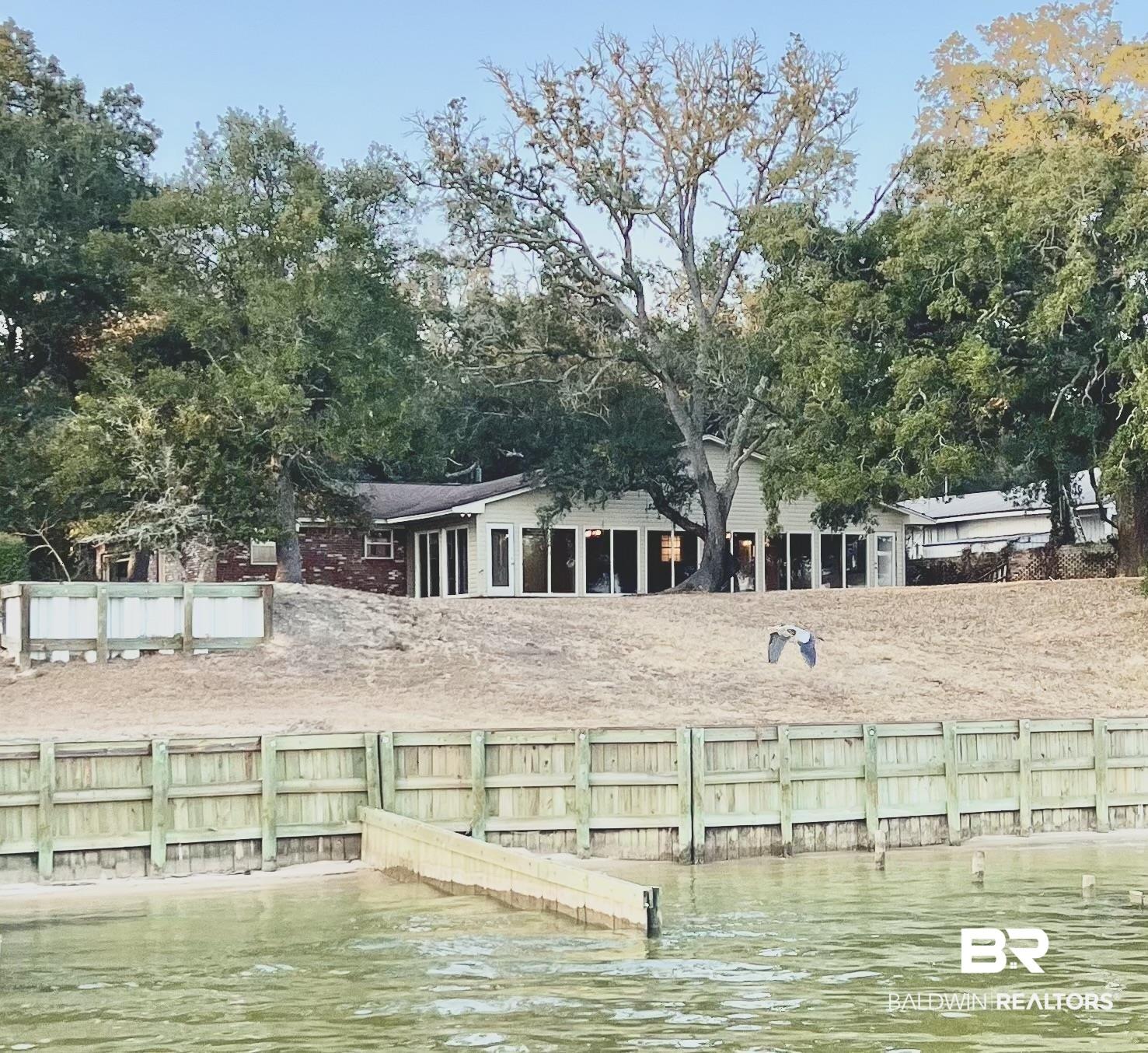 Image 1: Back of house From Water