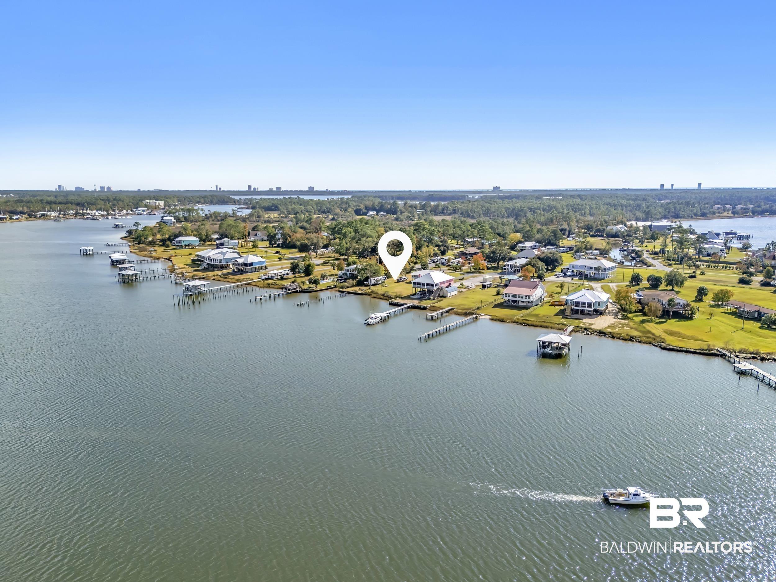 Image 1: Bird's eye view of a nearby body of water