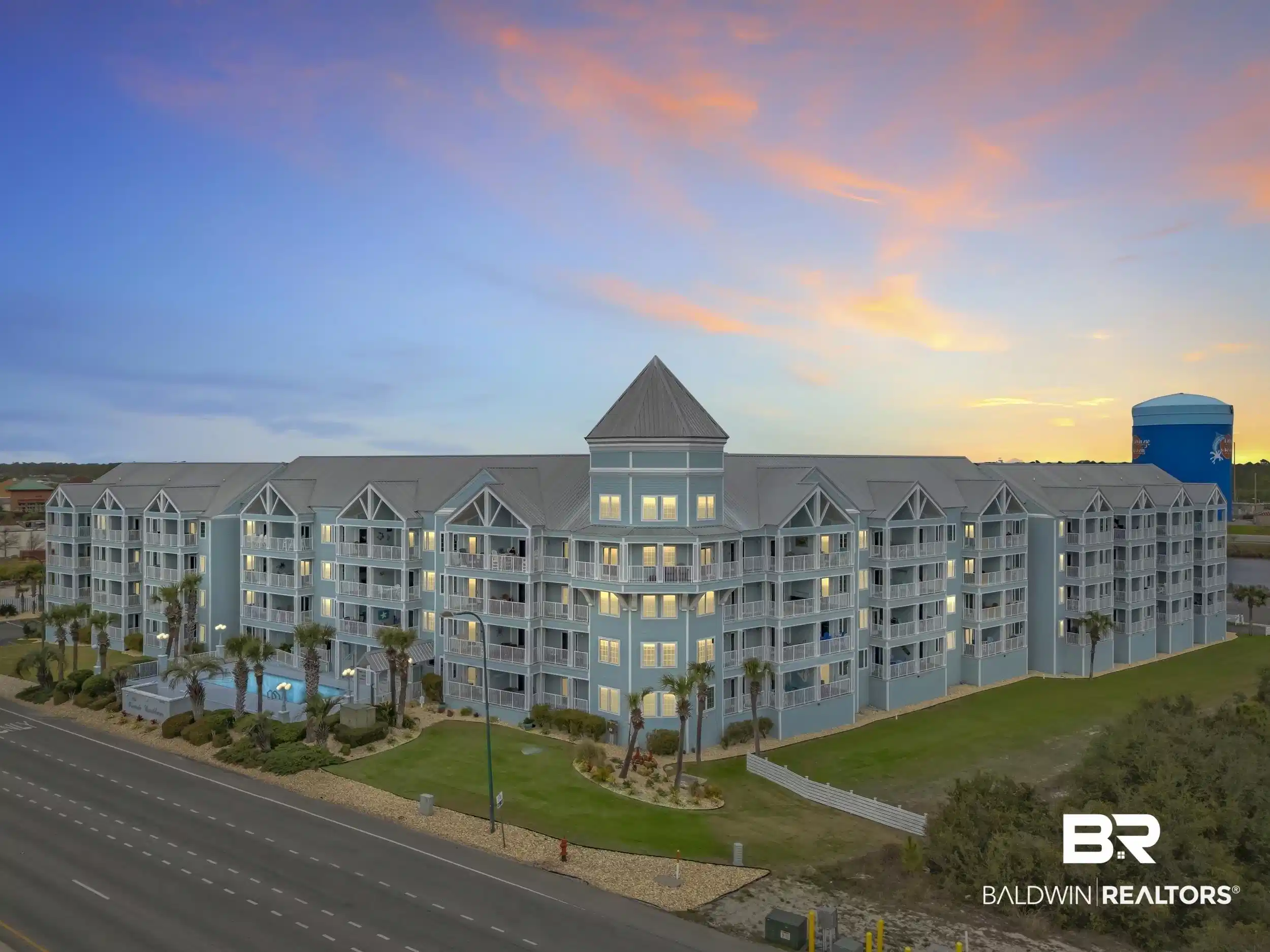 Image 1: View of apartment building / complex