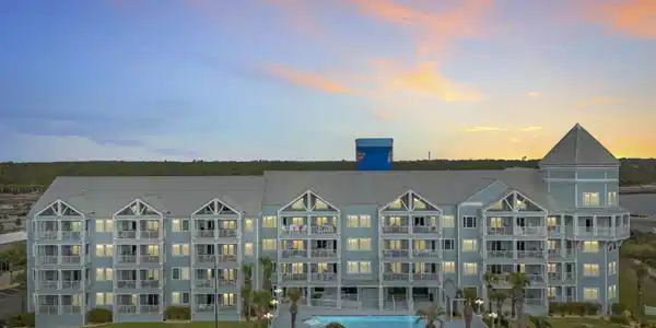 Image 2: View of property at dusk