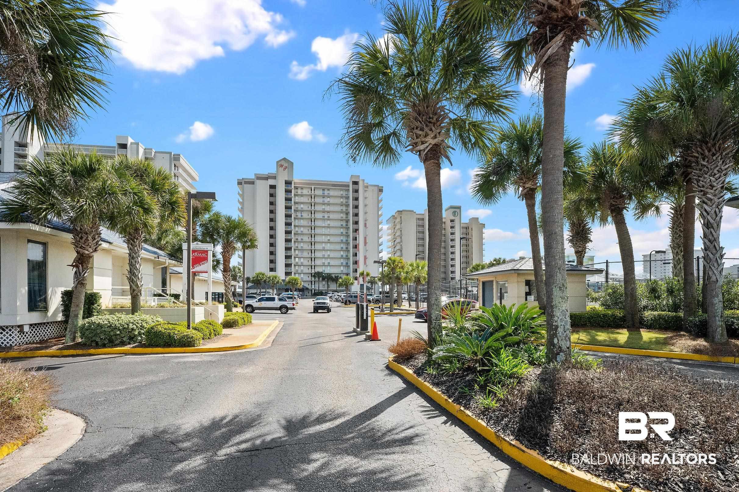 Image 4: View of asphalt road featuring curbs