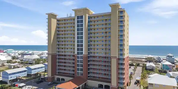 Image 2: View of apartment building / complex with a water view