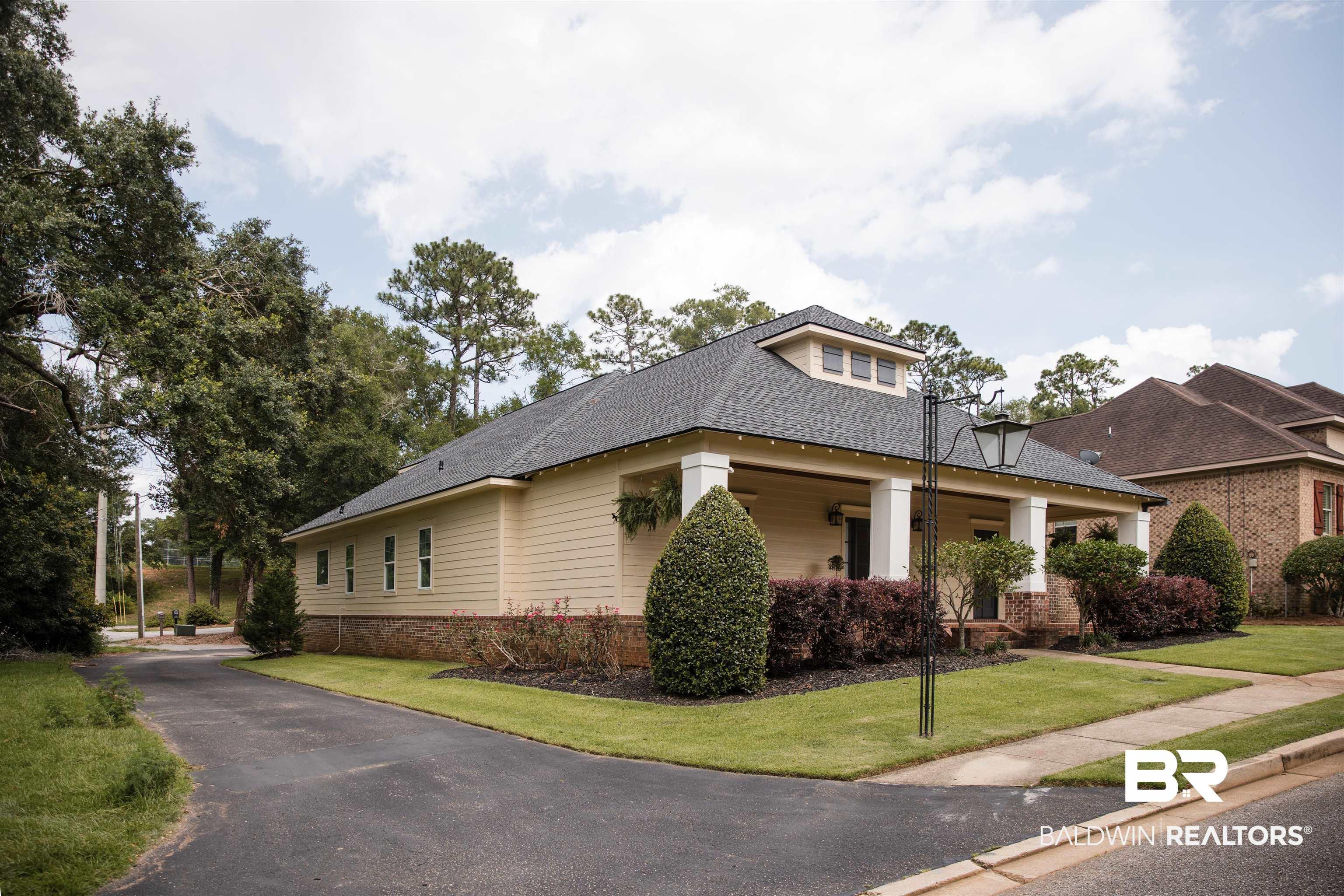 Image 2: Side of of the home showing that it sits on the end lot