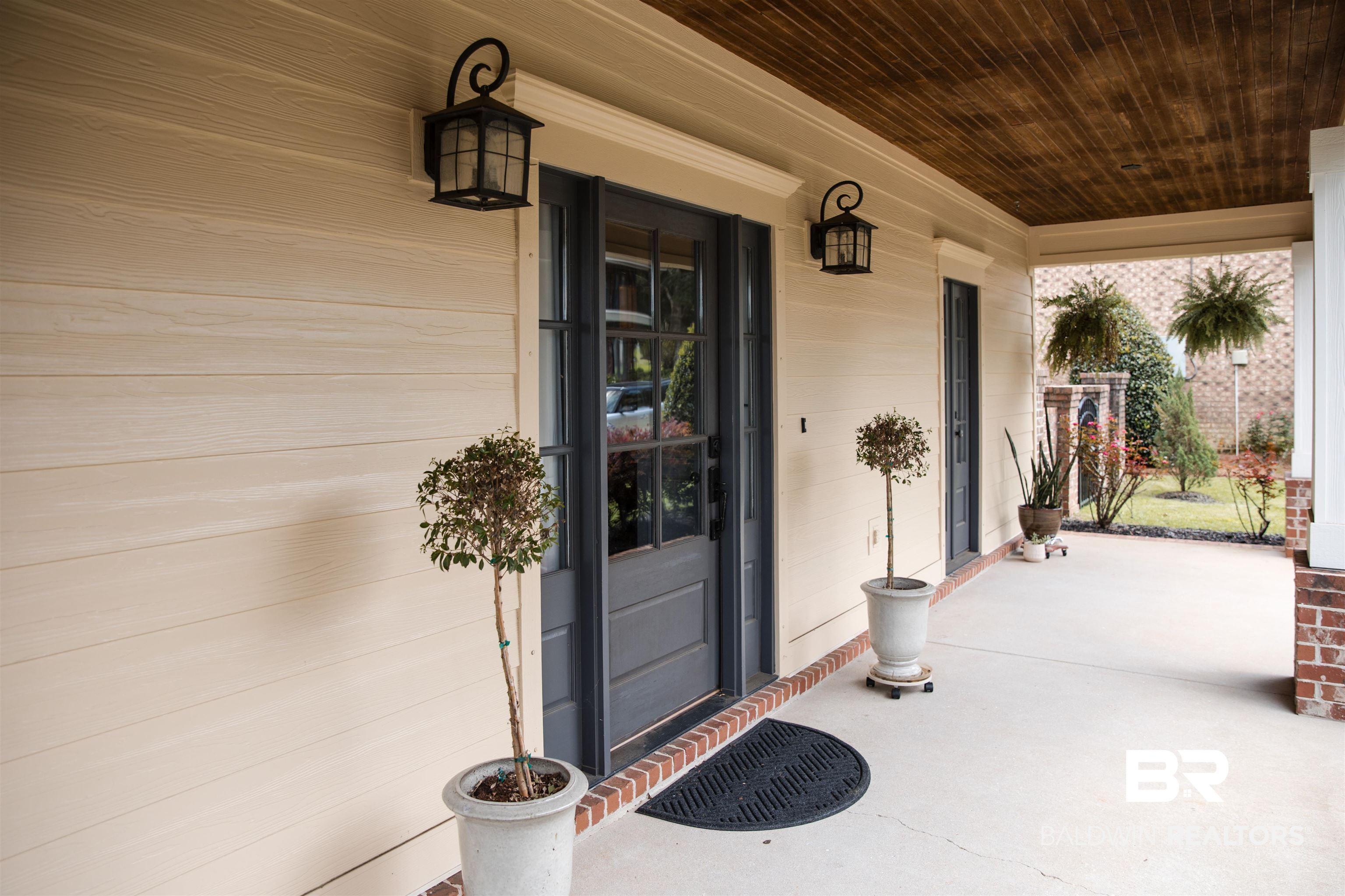Image 3: Front doors showing porch area