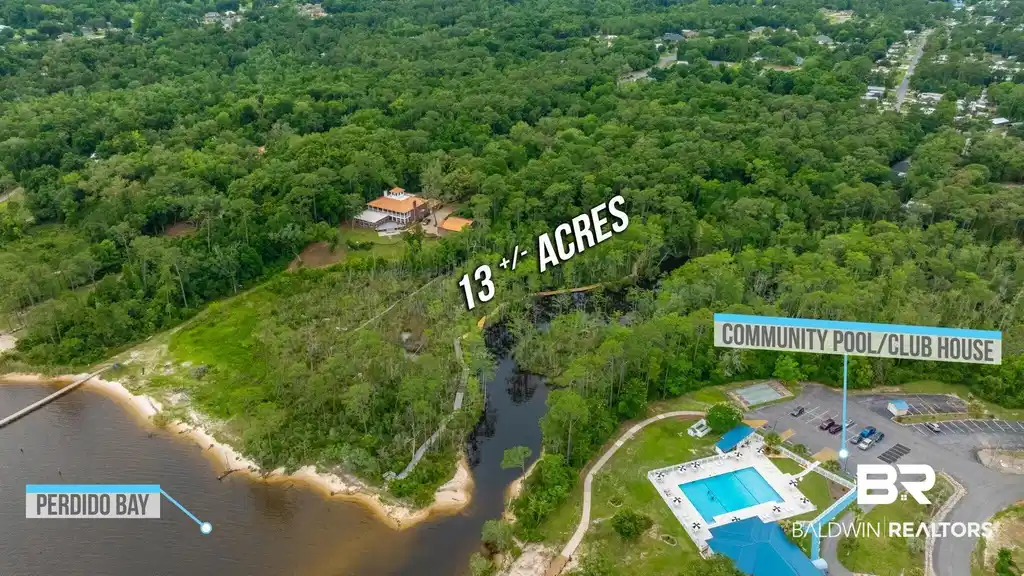 Image 1: Expansive 13+/- acre property featuring a waterside location on Perdido Bay