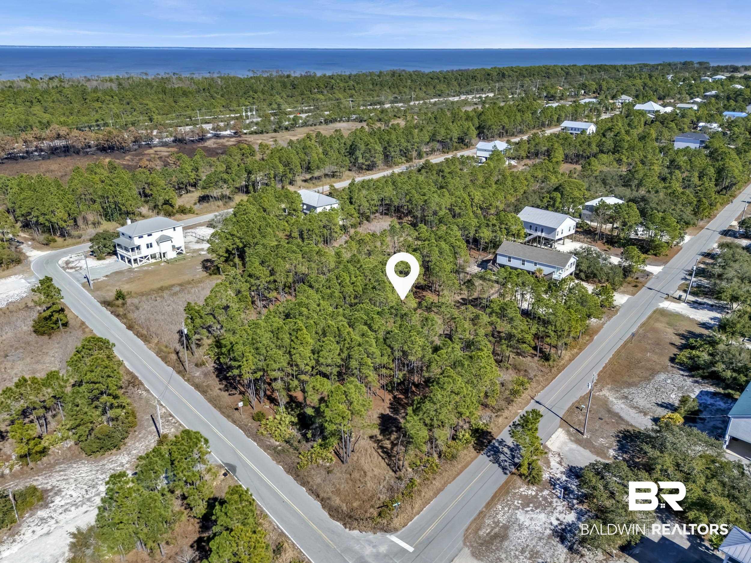Image 3: Aerial view of a nearby body of water