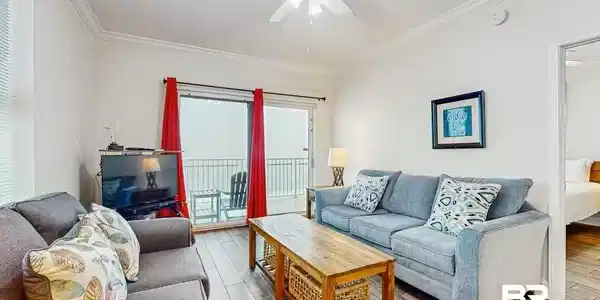 Image 2: Living area featuring wood-finish flooring, a ceiling fan, and crown molding