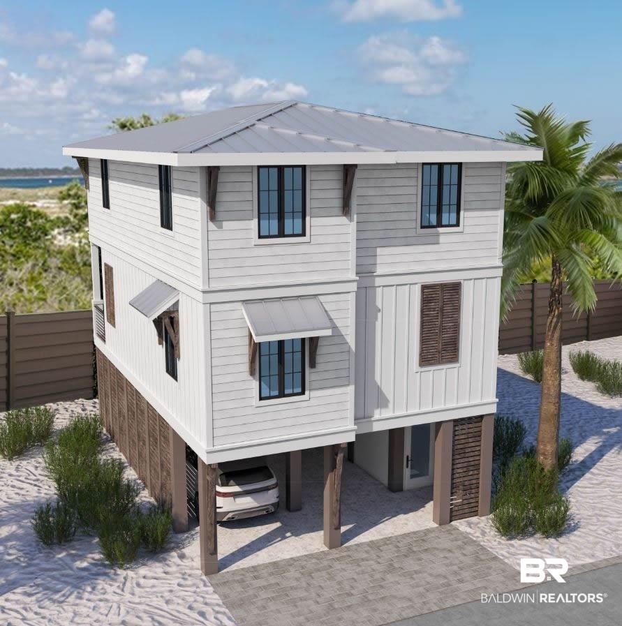 Image 2: View of front of home featuring a carport