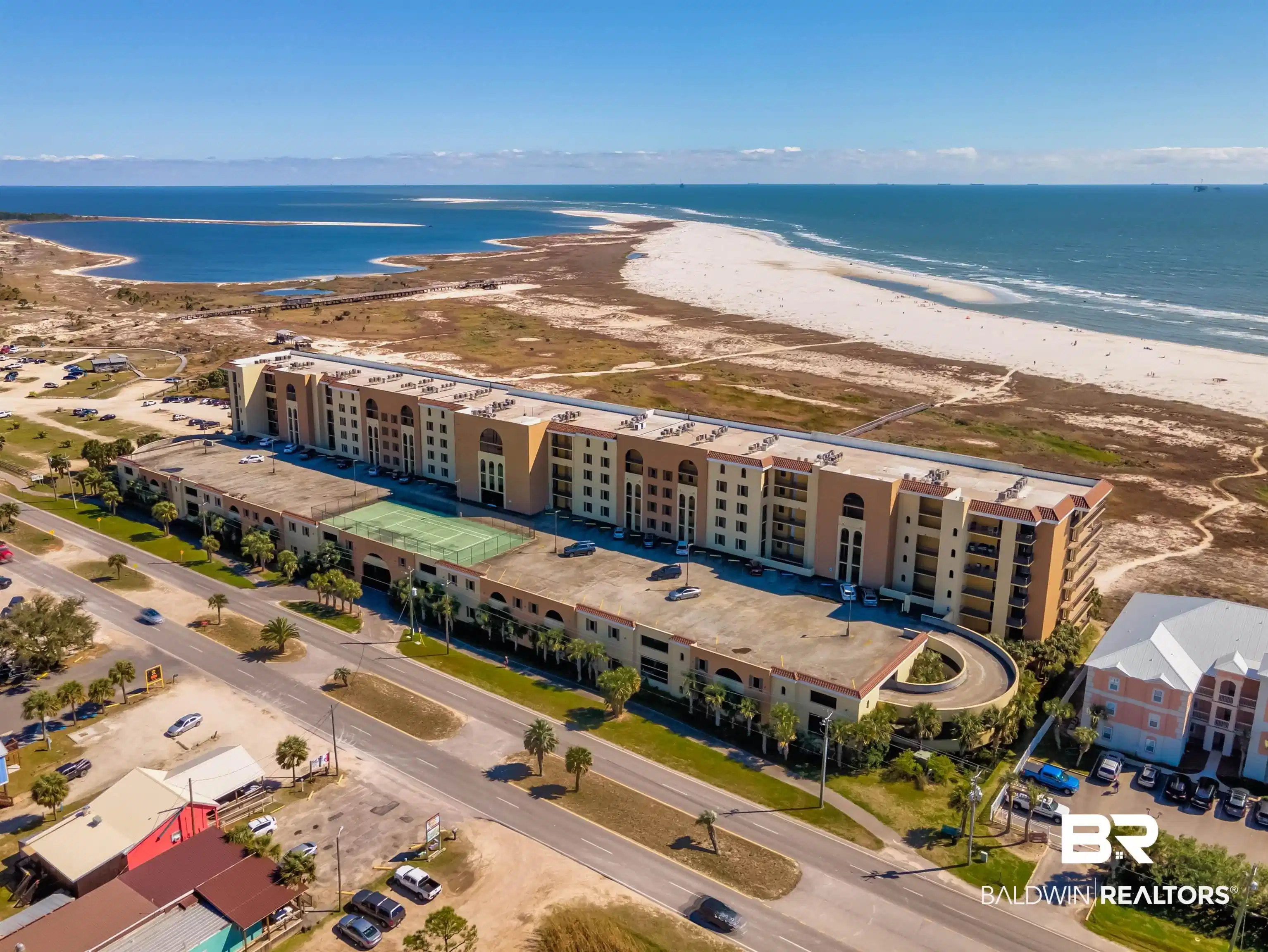 Image 1: Bird's eye view of apartment complex / building